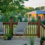 Custom Wood Decks vs. Composite Decks: What’s Best for Your Backyard?