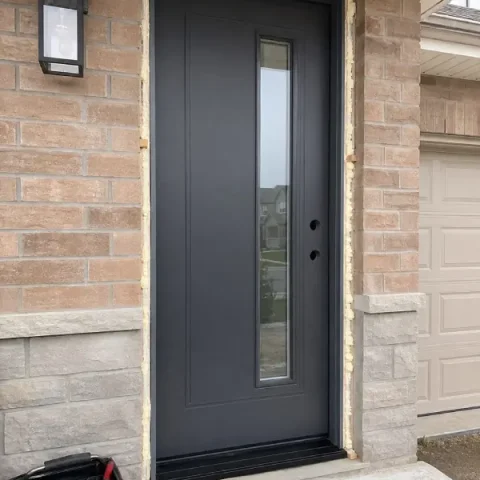 Door replacement being completed on a residential interior or exterior opening.