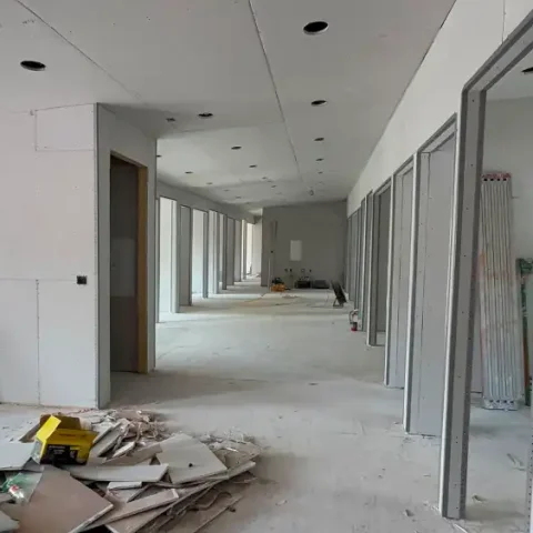 Professional drywall installation by Rouge Home Development with smooth wall finishes ready for painting.