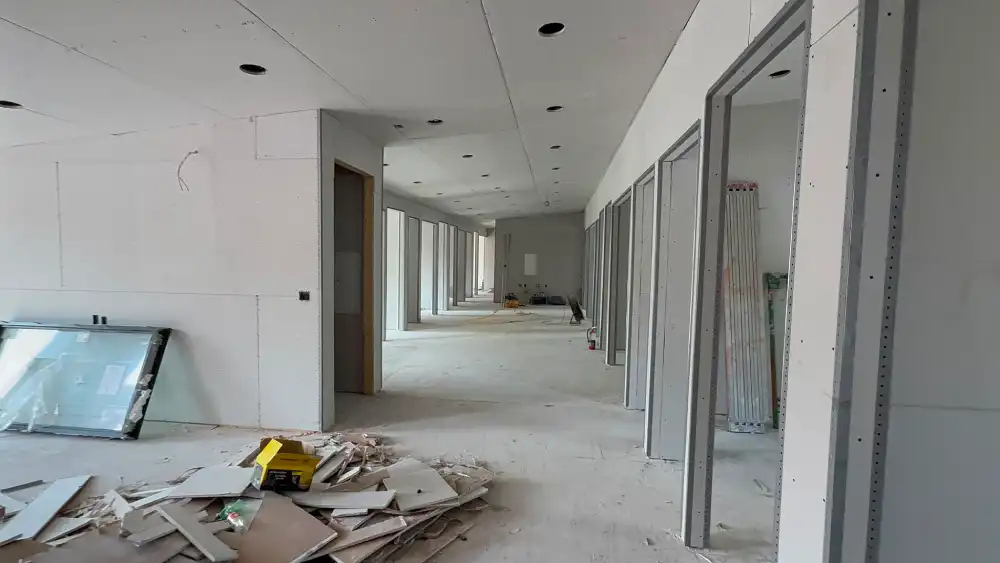 Professional drywall installation by Rouge Home Development with smooth wall finishes ready for painting.