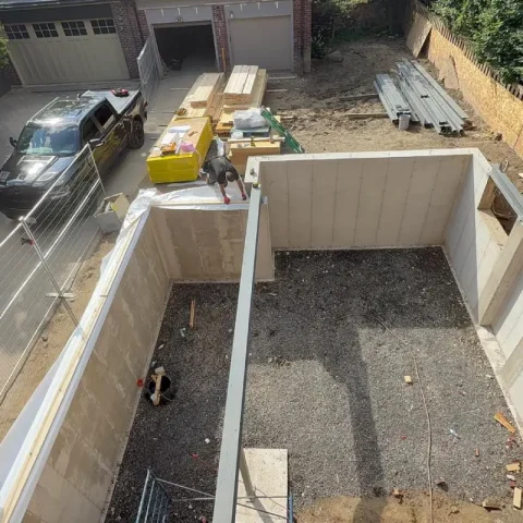 Foundation forming in progress for a new residential construction project.