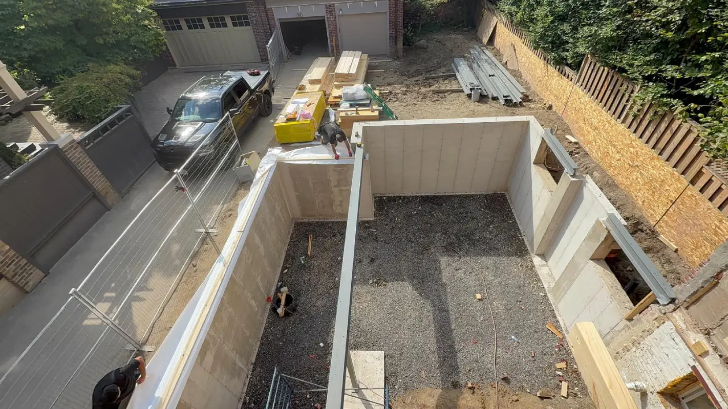 Foundation forming in progress for a new residential construction project.