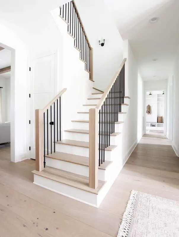 Fresh interior painting in progress on a residential wall for a clean, updated finish.