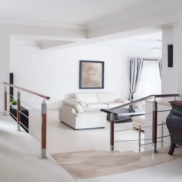 Finished basement family room with modern lighting and vinyl plank flooring
