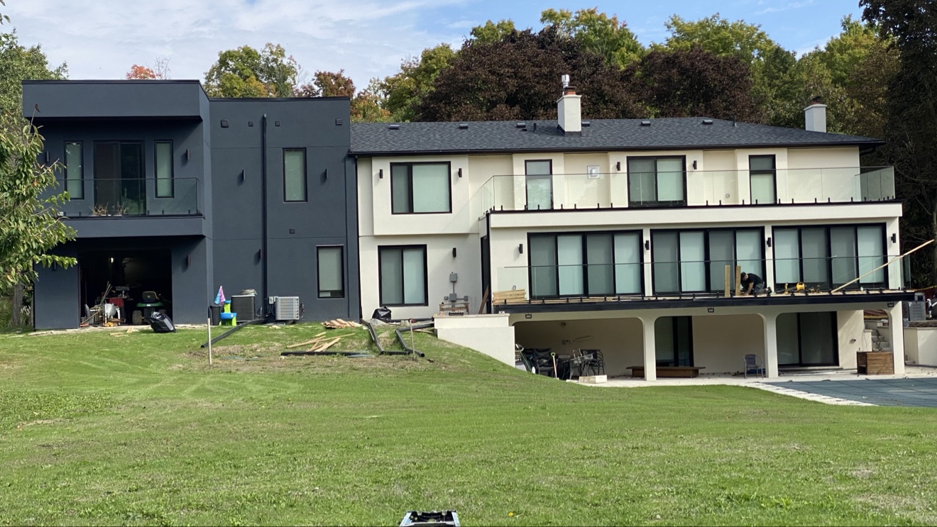 Finished modern black custom home exterior in Brampton