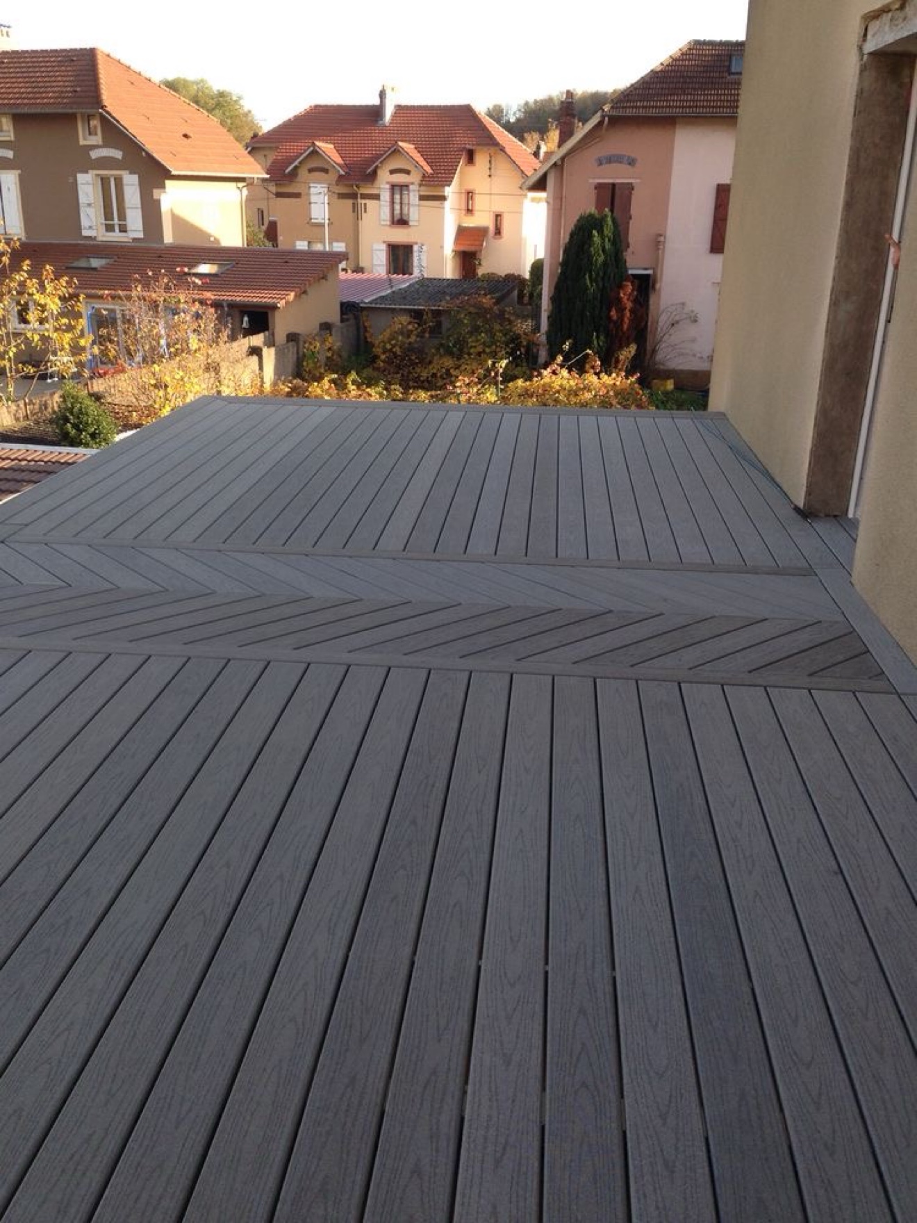 Composite deck with herringbone inlay detail — Rouge Home Development Inc., GTA