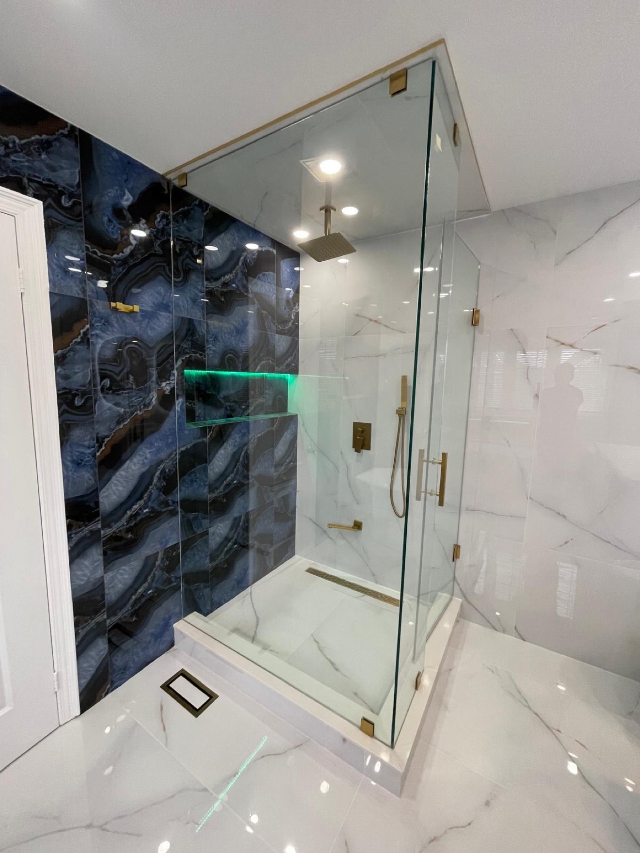 Finished bathroom renovation with glass shower — Rouge Home Development Inc., GTA