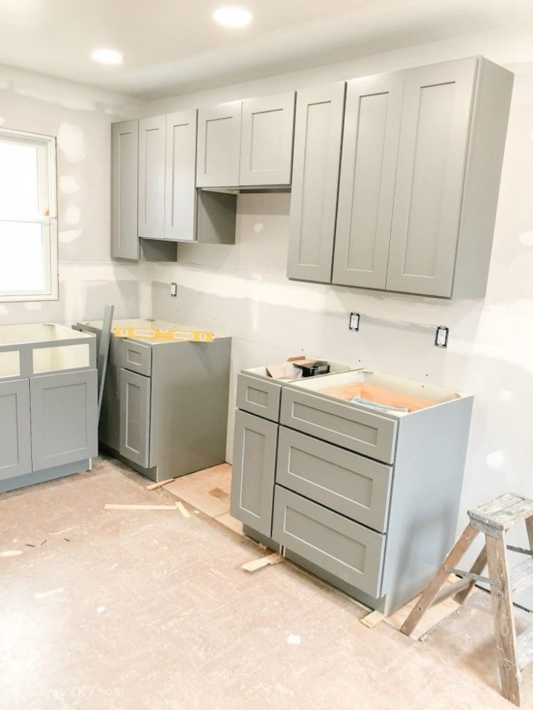 Renovated kitchen with stone countertops — Rouge Home Development Inc., GTA