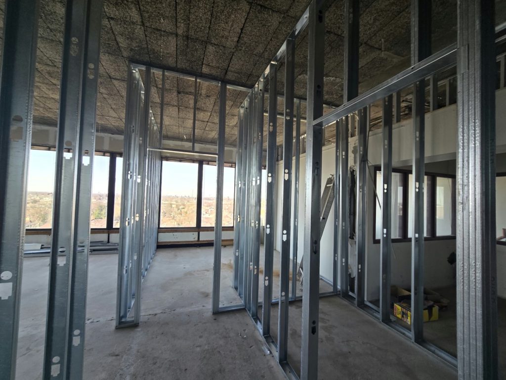 Steel stud framed rooms with city view — Rouge Home Development Inc., GTA