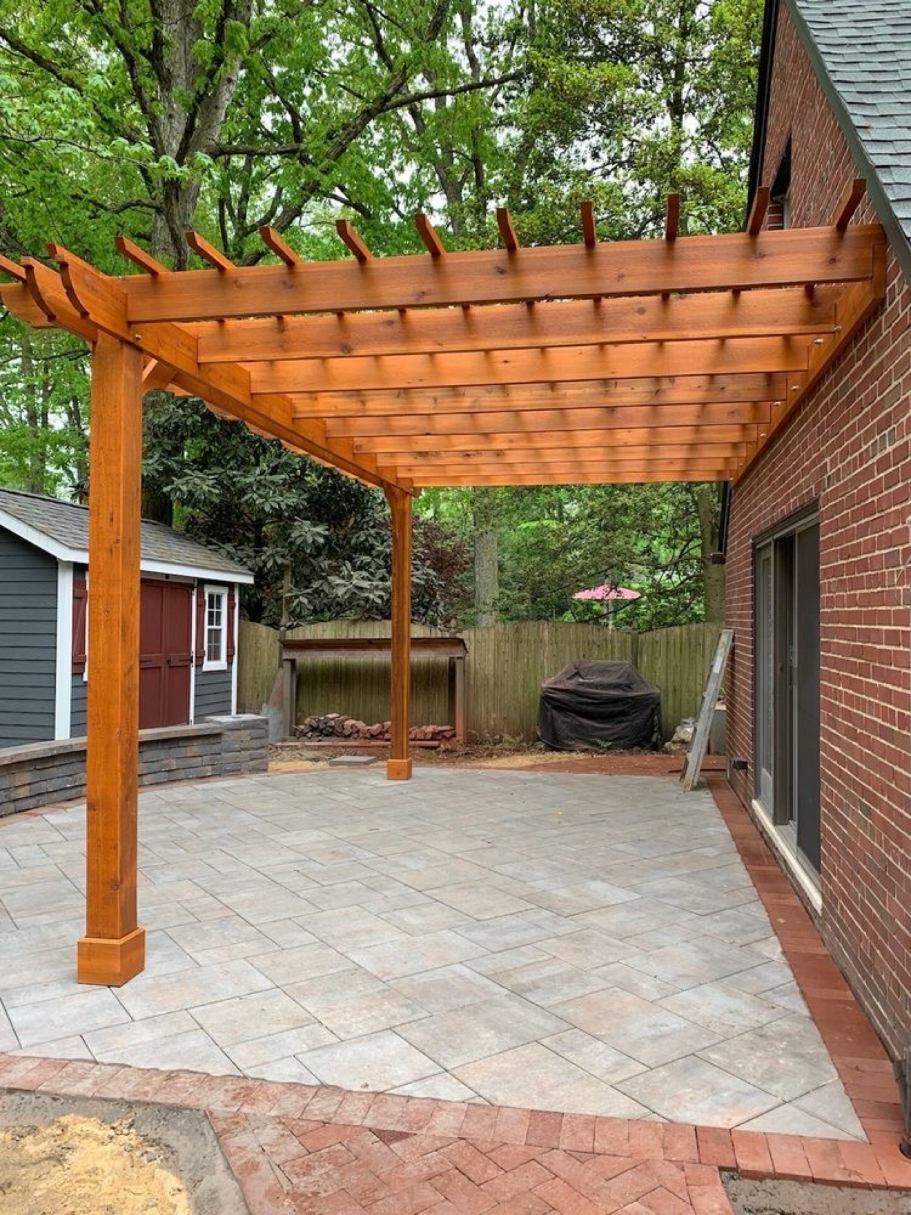 Cedar pergola over a backyard patio — Rouge Home Development Inc., GTA