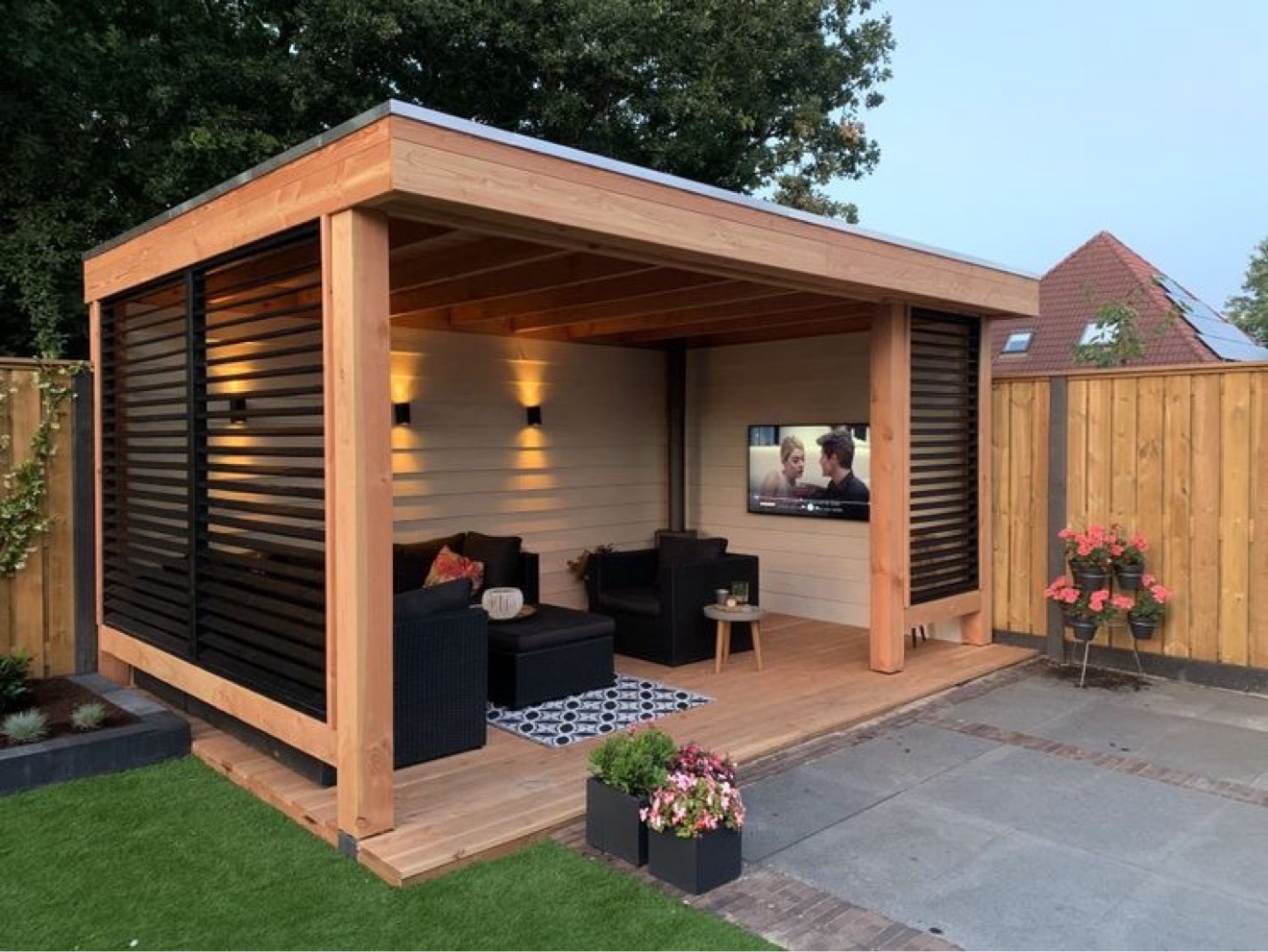 Modern cedar pergola lounge with louvered privacy screens and outdoor lighting — Rouge Home Development Inc., GTA